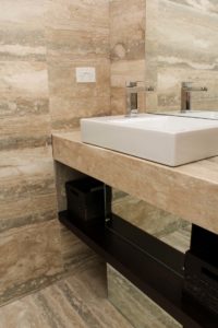 Wash basin with tap and mirror