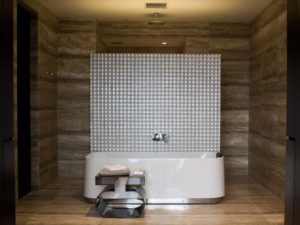 Bath tub inside bathroom
