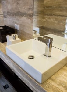 Wash basin infront of mirror