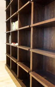 books in wooden shelf