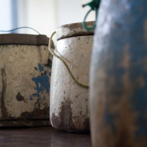 A close up of designer wooden pots with lids