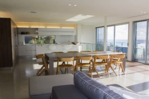 Dining hall with wooden table and chairs