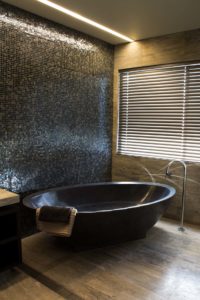 Metallic tab in tiles wall room