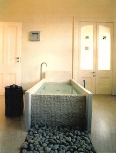 Stone made bath tab in white color room